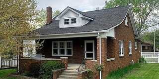 Stunning all brick 2 bedroom, 1 bath with 2 car garage and fully fenced back yard! Gallery 1