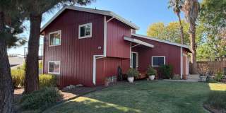 Beautiful 4-bedroom, 3-bath Tahoe-inspired home with vaulted ceilings, spacious decks, stunning downtown Concord views, and an oversized two-car garage Gallery 1