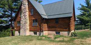 Log Cabin in Pilot Grove, MO Gallery 1