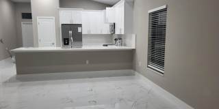 Brand-New Luxury Home with 3-Car Garage & Lawn Care Included | Modern Living in Cape Coral! Gallery 7