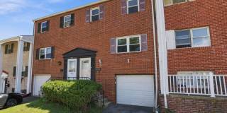 Spacious 3-Bedroom Townhouse with Garage & Finished Basement Gallery 1
