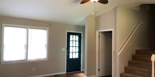 Travelers Rest !! 3 BR, 2 BA with Great Living Space - Den, Bonus Room, Primary Suite has a HUGE walk in Closet, Laundry Room, private screened in porch & deck AND a storage shed out back.  Fresh Paint and New LVP Floors Gallery 3