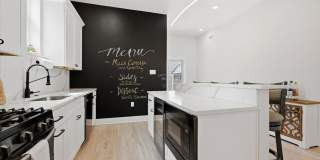 Detached Luxury 4BR/3B Retreat with Skyline Rooftop Deck, Wet Bars, Driveway & Massive Yard Gallery 8