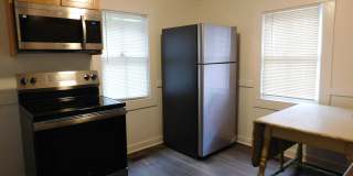 611 Johnson Street- OFFERING 1 MONTH FREE WITH A YEAR'S LEASE! Historic Downtown living! New paint and flooring throughout! New appliances! Recent price reduction! Gallery 15