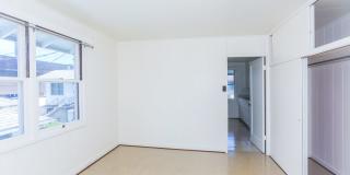 Waiola - upstairs 1 bedroom with 1 parking - window air conditioner in bedroom.. Gallery 11