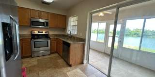 Beautiful Townhome in a gated community with assigned parking spots and a community pool Gallery 8