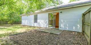Refreshed 3 BR/2 BA home near I-49/UofA! Large fenced yard! Gallery 14