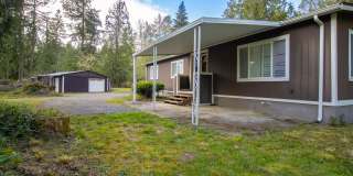 2 Bed / 2 Bath Home with 4-Car Garage, Large Yard & RV Parking in Graham! Gallery 4