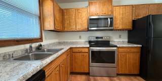 August 15th rent special! New deck! 3 Bedroom, updated kitchen, updated flooring, garage, driveway, and fenced yard - 9 month lease available! Gallery 30