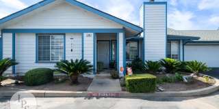 Charming Gated 2-Bed Condo with Attached 2-Car Garage & Water/Garbage Included in Prime Fresno Location Charming Gated 2-Bed Condo with Attached 2-Car Garage & Water/Garbage Included in Prime Fresno Location Gallery 1