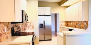 Experience Bell Tower Park. GATED ground floor 2 Bed 2 Bath Den 1 Car Garage Condo. Gallery 20