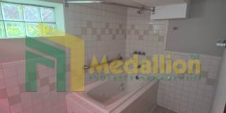 Spacious 6-Bedroom Home with Finished Basement and Backyard Gallery 22