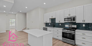 Completely Renovated 4BR Brick Home with 3 Full Baths & Off-Street Parking Gallery 1