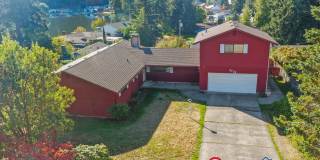 MOVE IN READY NOW! Peek a boo view of Pattison Lake - 3 bedrooms plus huge bonus room - bring your home business! Gallery 1