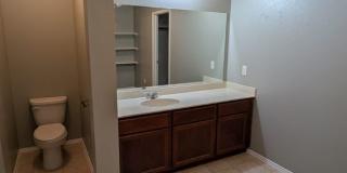 2 car garage with lighting, granite countertops. Backyard includes a custom extended concrete patio perfect for gatherings Gallery 31