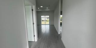 New 4 Bed / 2 Bath / 2 Car Garage Family Retreat in Desirable Lehigh Acres! Gallery 19