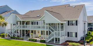 Ground floor, 2 bedroom, 2 bath, end unit- 10 mins to Surfside Beach. Gallery 1