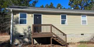 2 bedroom 1 bath home for rent for $875. Water, sewer  landscaping is included in rent! Gallery 1
