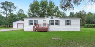 beautifully refreshed 3-bedroom, 2-bath home offering peaceful country living with modern updates! Gallery 1