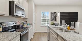 Welcome to this like new fully furnished home located in The Village at Courthouse Commons in Spotsylvania. Gallery 13