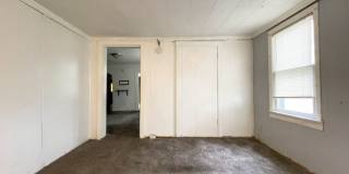 Fall into this cozy 3-Bedroom Home with a fenced in yard  detached garage! Gallery 1