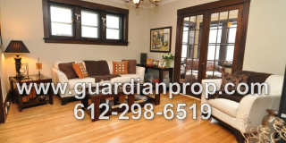 Main Floor Condo Available June 1st in Merriam Park, Original Woodwork  Built-ins, Sunroom, In Unit Laundry! Gallery 1