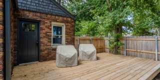 Completely remodeled like new Gingerbread midtown cottage with gleaming hardwoods, converted from a 3/1 to a 3/2. Gallery 43