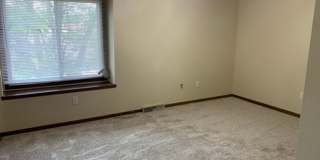2 BR, 1.5 BA Clive split level duplex.  Deck and one car attached garage. Gallery 11