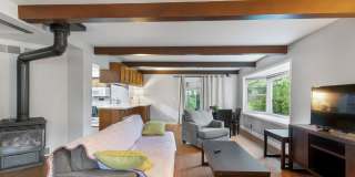 Home-Like Living with Sunroom, Attached Garage & In-Unit Laundry Gallery 1