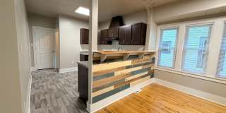 Updated Open Concept 5BR/2BA Rent to Own Home with Garage Gallery 1
