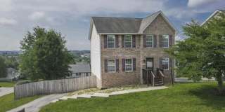 Spacious Home with Beautiful Sunroom & Lawn Care Included Gallery 1