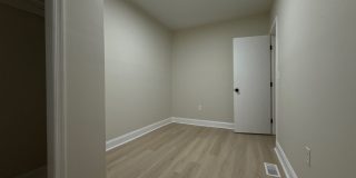 Modern 3BR Rowhome with Finished Lower Level & Rear Deck Gallery 11