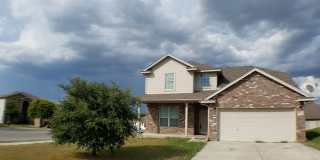 Large 4 bed house with master downstairs and 2 car garage on a cul- de-sac. Golf course community right off 35. Gallery 1