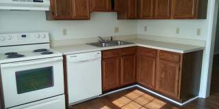 Three Bedroom Townhome, 2.5 bath, with eat-in kitchen, small deck off of living room. Gallery 1