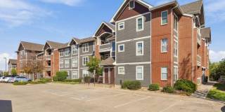Beautiful Ground-Floor 2-Bedroom Condo with Private Balcony & Great Location! Gallery 1