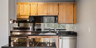 $500 off! Spacious 1-bdrm/1-bath condo in quiet neighborhood. Balcony, 2 parking spaces, fireplace, hot tub, & pool Gallery 22
