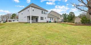 Rare 2023-built home on an oversized 0.35-acre lot in one of Waxhaw's most sought-after communities — zoned for the 9/10-rated Waxhaw Elementary School and move-in ready today. Gallery 11