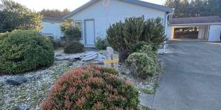 Beautiful 3 bedroom 2 bath home with a large carport in Bandon, OR. Gallery 1