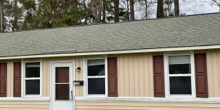 Charming two bedroom one bath duplex that is centrally located! Just minutes from area bases, shopping, restaurants, and beaches. All pets must be approved by the owner NO CATS. Owner will only accept 2 dogs. Gallery 1