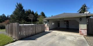 Newley updated 3-bedroom home features fenced yard, garage, and covered patios! Gallery 1