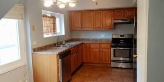 Cozy 3 bedroom 1.5 Bathroom Townhouse! Hardwood Throughout! Parking Included In Rent! Available for a June Move In! Gallery 6