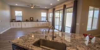 Gorgeous 4 Bed + den Single Level Home in gated community in North Peoria with RV Gate / BBQ!! Gallery 7