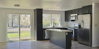 Charming 4BR Home with Huge Yard - W/D and Garage Gallery 4