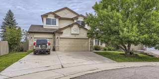 Evolve Real Estate: Magnificent Residence 4 Beds/4 Baths with Large Backyard and Fully Finished Basement in Cul-De-Sac in Rock Creek Ranch! Gallery 1