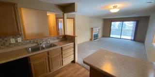 Top Floor Condo Available March 1, Open Floor Plan, Balcony, Fireplace, Walk-in Closet, 2 Baths, Garage Included Gallery 1