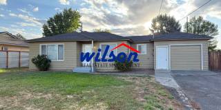Charming 3-Bedroom Retreat with Fenced Back Yard! Gallery 1