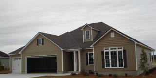 Southern Comfort Living: Elegant 4BR/2BA Home with 3-Car Garage, Close to Moody AFB in Lakeland, GA Gallery 1