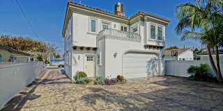 SPACIOUS & BRIGHT, TWO-STORY HOME W/ FRONT YARD, BALCONY & 2-CAR GARAGE CLOSE TO SHOPPING, FREEWAY ACCESS, RB BORDER & MINS TO BEACH! Gallery 1