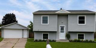 Spacious 3-Bedroom Home with Finished Basement, Large fenced-in backyard, and 2-Car Detached Garage in Milan! Gallery 1
