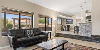 Furnished Basement home ready for move in NOW!!!  Corner lot, No HOA, lots of parking!!!  RV gates!!!  Luxurious backyard with pool and is your own Oasis in the City just out of the City!!!  Close to Lake Pleasant!!! Gallery 4